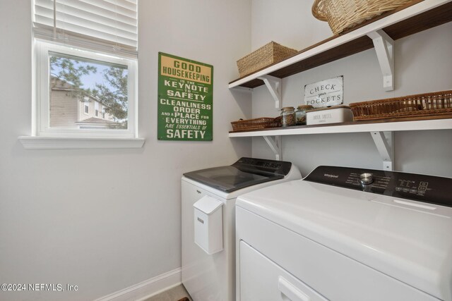 laundry room featuring washer and clothes dryer