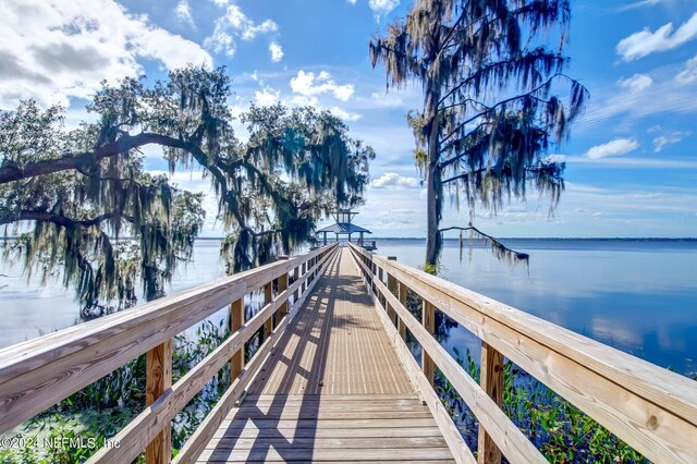 dock area featuring a water view