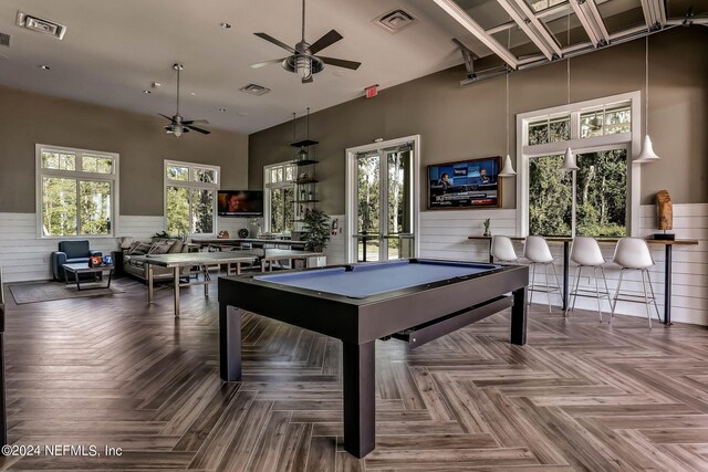 playroom featuring ceiling fan, pool table, dark parquet flooring, and a towering ceiling