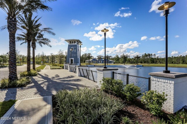 view of home's community featuring a water view