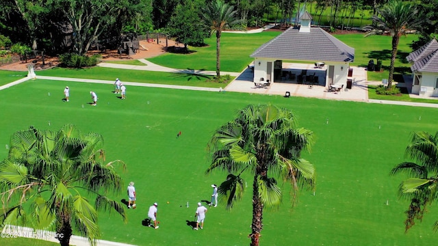 view of home's community with a lawn and a gazebo