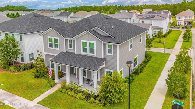 drone / aerial view with a residential view