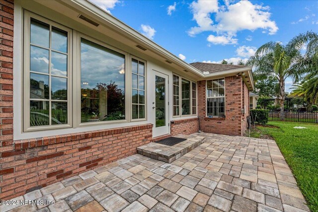 view of patio with fence