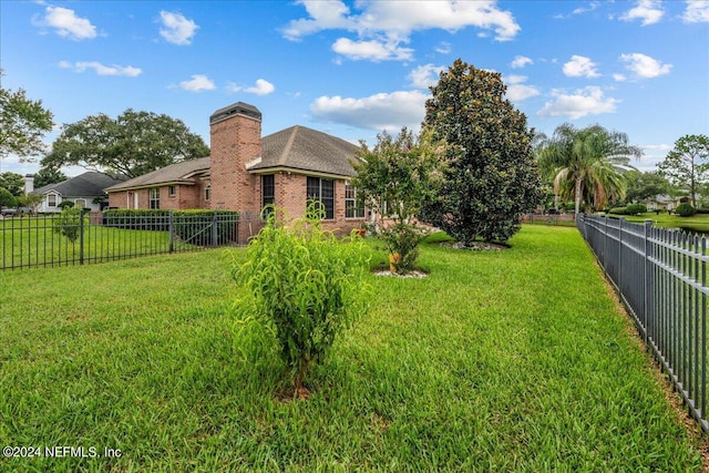 view of yard featuring a fenced backyard