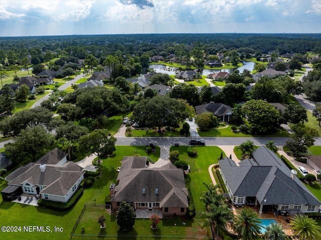 bird's eye view with a water view and a residential view