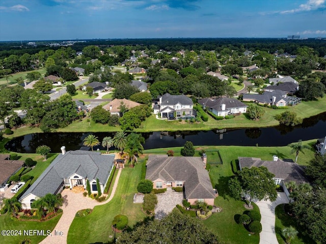 bird's eye view featuring a water view and a residential view