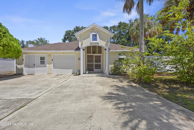 front of property with a garage