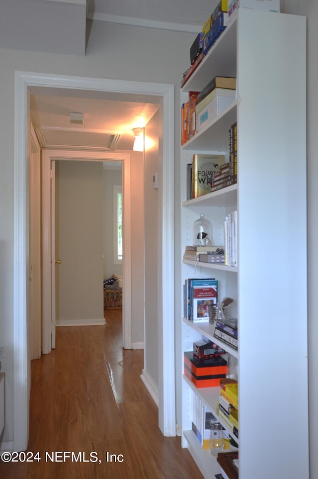 hallway featuring hardwood / wood-style flooring