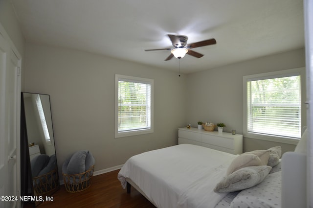 bedroom featuring ceiling fan and wood-type flooring