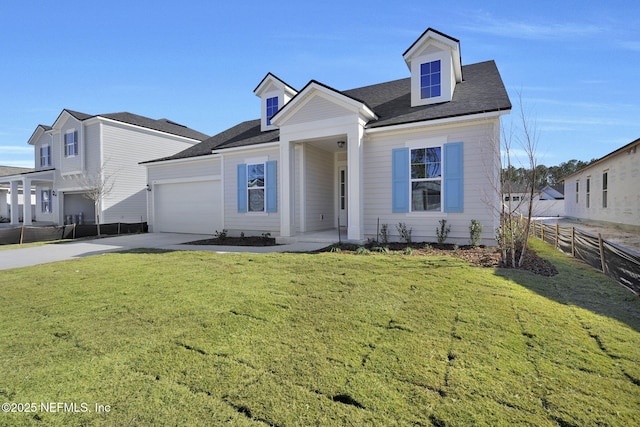 cape cod-style house with a garage, a front yard, concrete driveway, and fence