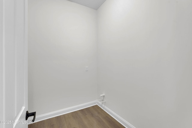 laundry room featuring hardwood / wood-style flooring