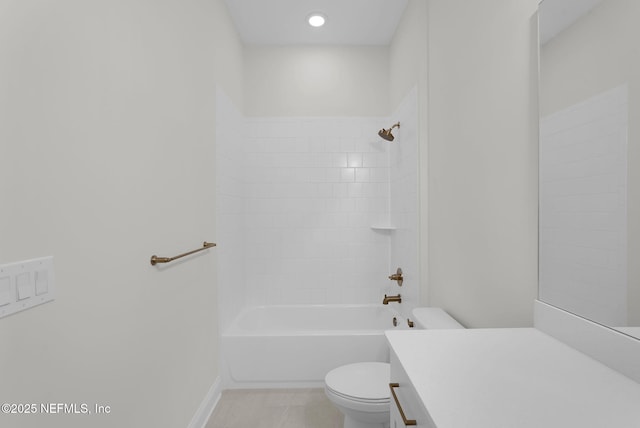 full bathroom with vanity, toilet, and tiled shower / bath combo