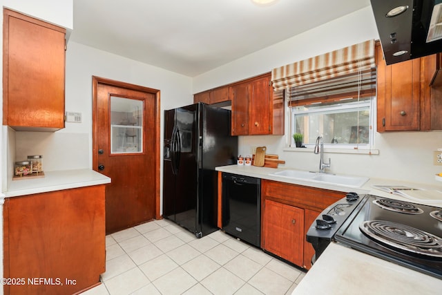 kitchen featuring sink and black appliances