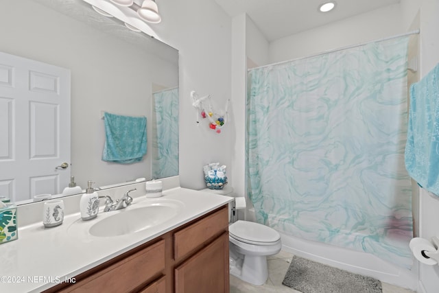 bathroom with toilet, tile patterned floors, vanity, and shower / tub combo with curtain