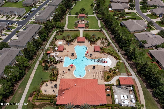 birds eye view of property with a residential view