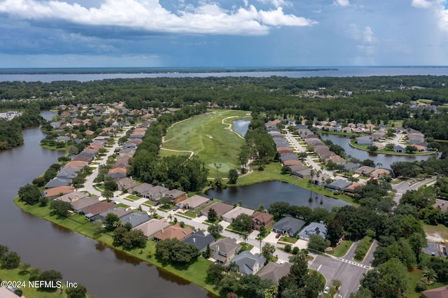 aerial view featuring a water view and a residential view