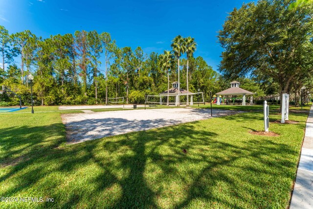 1912 White Dogwood Ln, Fleming Island, FL 32003 - view of home's community featuring a lawn, a gazebo, and volleyball court