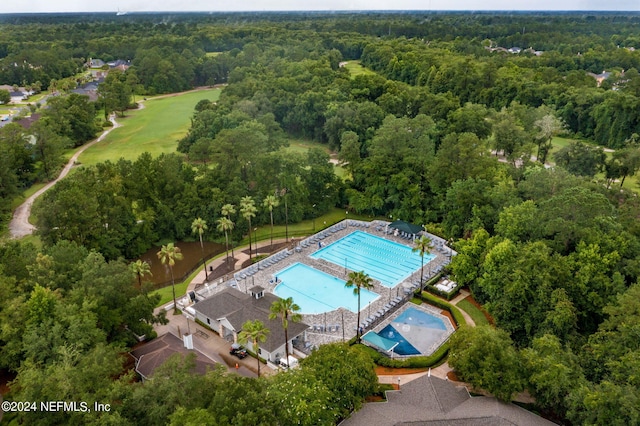 aerial view featuring a view of trees