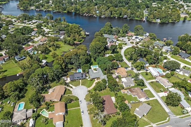 aerial view featuring a water view and a residential view