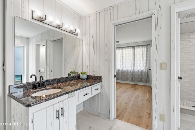 full bath with visible vents and vanity