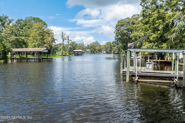 view of dock with a water view