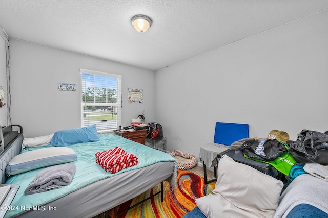 bedroom with a textured ceiling