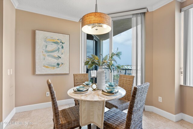 tiled dining area with ornamental molding