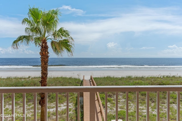 property view of water featuring a beach view