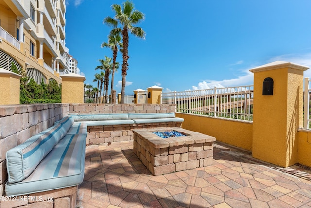 view of patio / terrace featuring fence