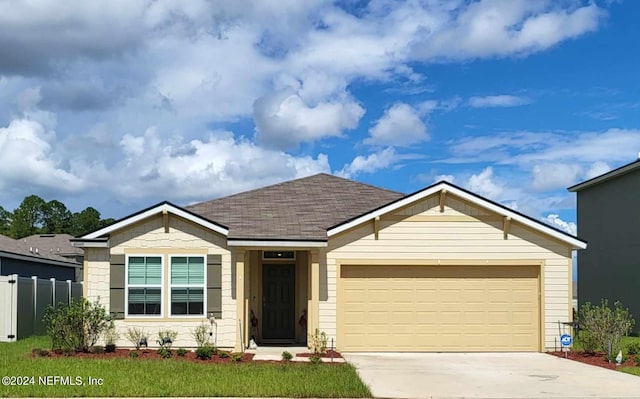 view of front of home with a garage