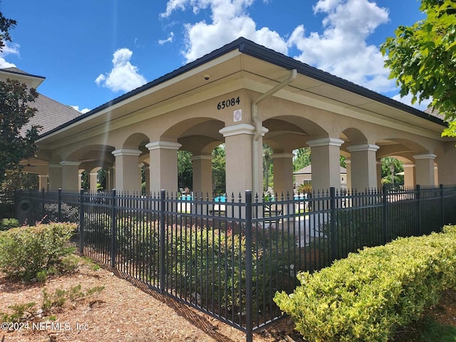 view of home's community with a fenced front yard