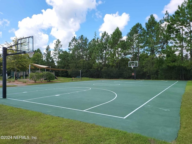 view of basketball court featuring community basketball court, a yard, and volleyball court