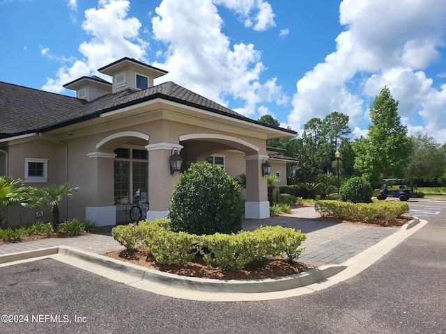 exterior space featuring stucco siding