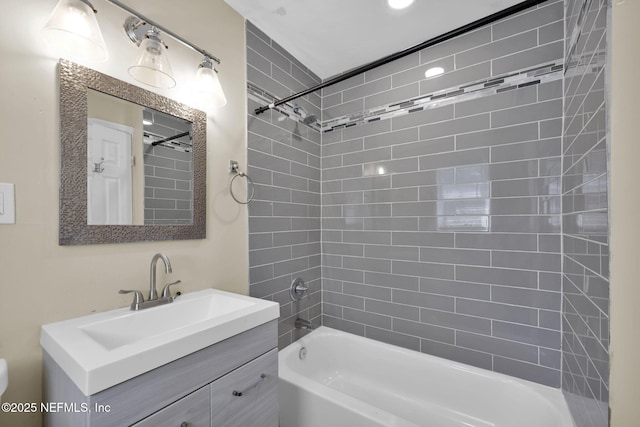 bathroom with shower / washtub combination and vanity