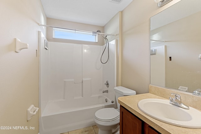 full bathroom featuring vanity, shower / bath combination, toilet, and tile patterned floors