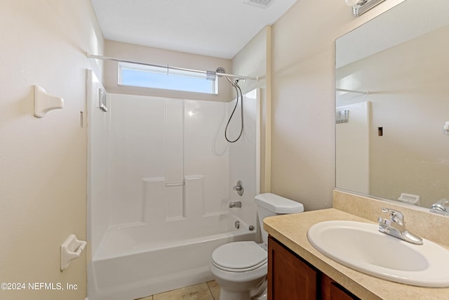 full bath featuring visible vents, shower / bath combination, toilet, vanity, and tile patterned floors