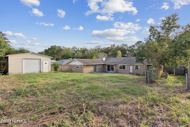 exterior space with an outdoor structure and a garage