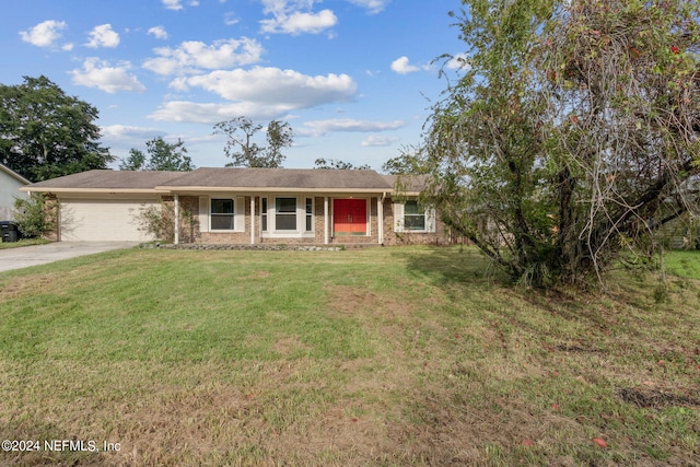 ranch-style house with a front yard and a garage