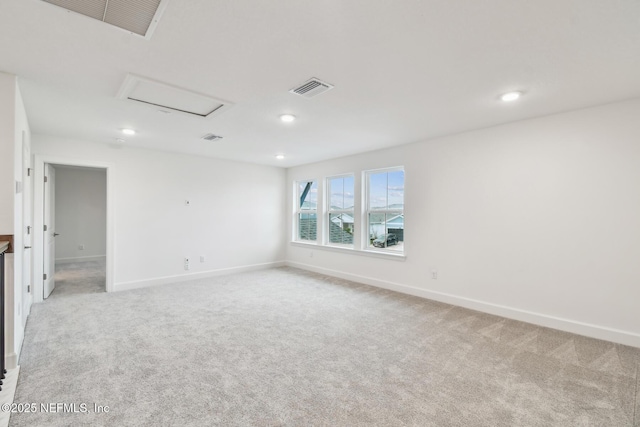 211 Rushing Dr, Saint Augustine, FL 32092 - unfurnished room featuring attic access, light carpet, and recessed lighting
