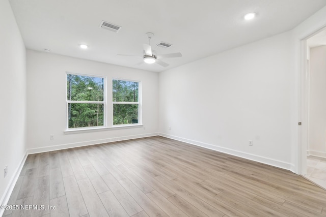 211 Rushing Dr, Saint Augustine, FL 32092 - unfurnished room with wood finished floors, ceiling fan, and recessed lighting