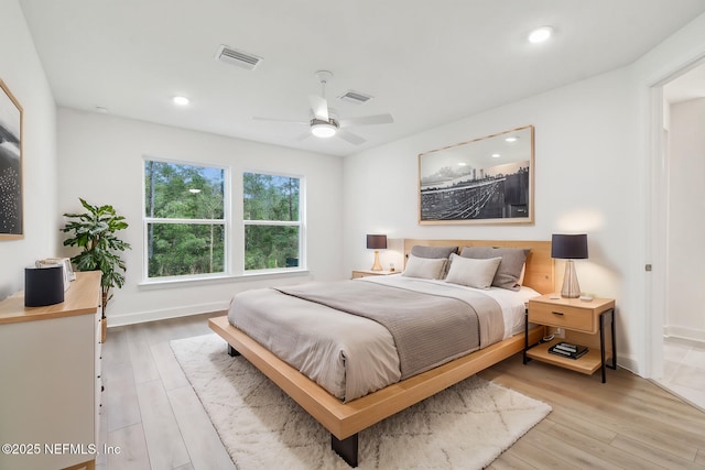 211 Rushing Dr, Saint Augustine, FL 32092 - bedroom with light wood finished floors, a ceiling fan, and recessed lighting