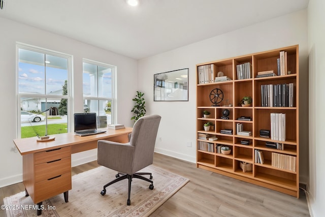 211 Rushing Dr, Saint Augustine, FL 32092 - home office featuring light wood-style flooring and baseboards