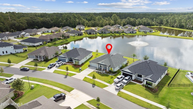 drone / aerial view featuring a water view