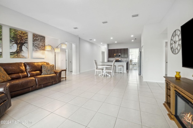 living room featuring light tile patterned floors