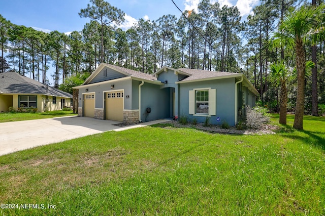 ranch-style house with a garage, concrete driveway, a front lawn, and stucco siding