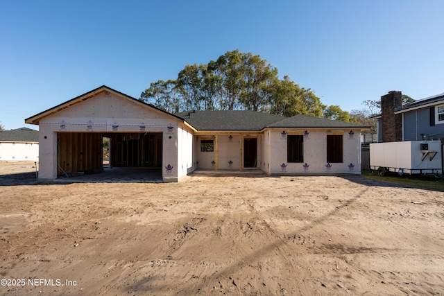 property in mid-construction featuring an attached garage