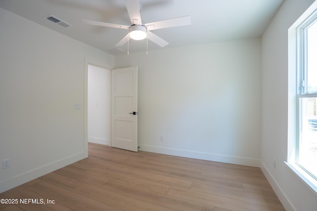411 Royal Rd, Saint Augustine South, FL 32086 - spare room featuring ceiling fan, light wood finished floors, and healthy amount of natural light