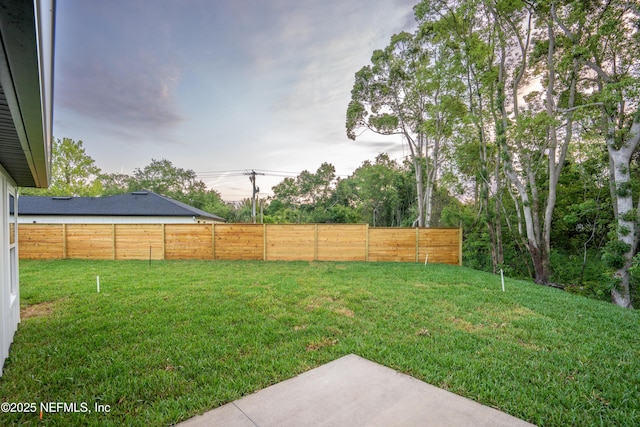 411 Royal Rd, Saint Augustine South, FL 32086 - fenced backyard with a patio area