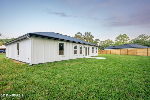 411 Royal Rd, Saint Augustine South, FL 32086 - rear view of house featuring board and batten siding