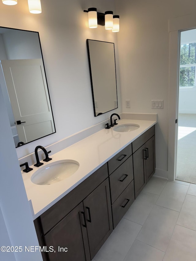 bathroom featuring vanity and tile patterned flooring